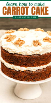 Carrot cake with raisins on a cake stand.