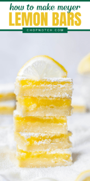 A stack of Meyer lemon bars with a lemon slice on top.