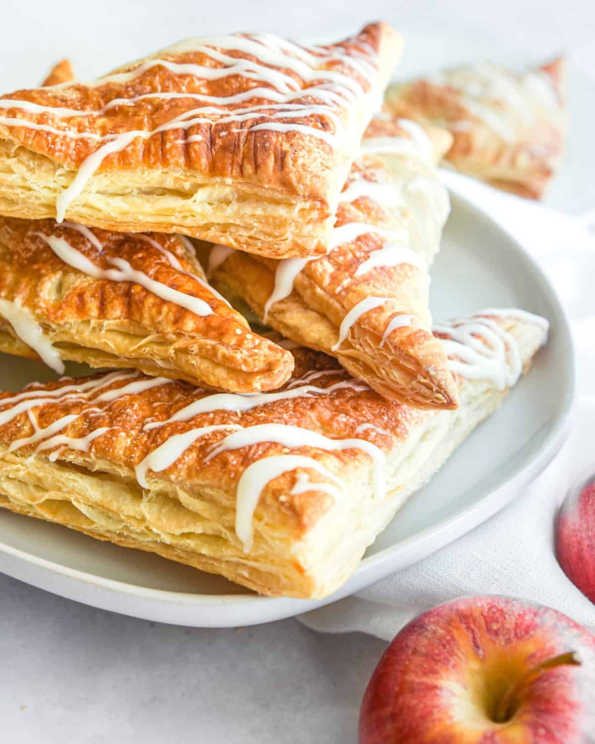 A stack of finished apple turnovers.