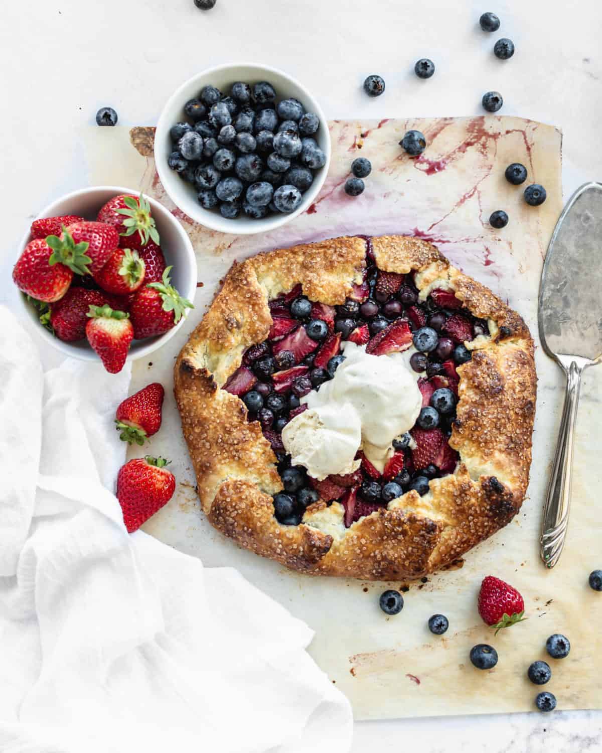 Blueberry and strawberry pie with fresh fruit.