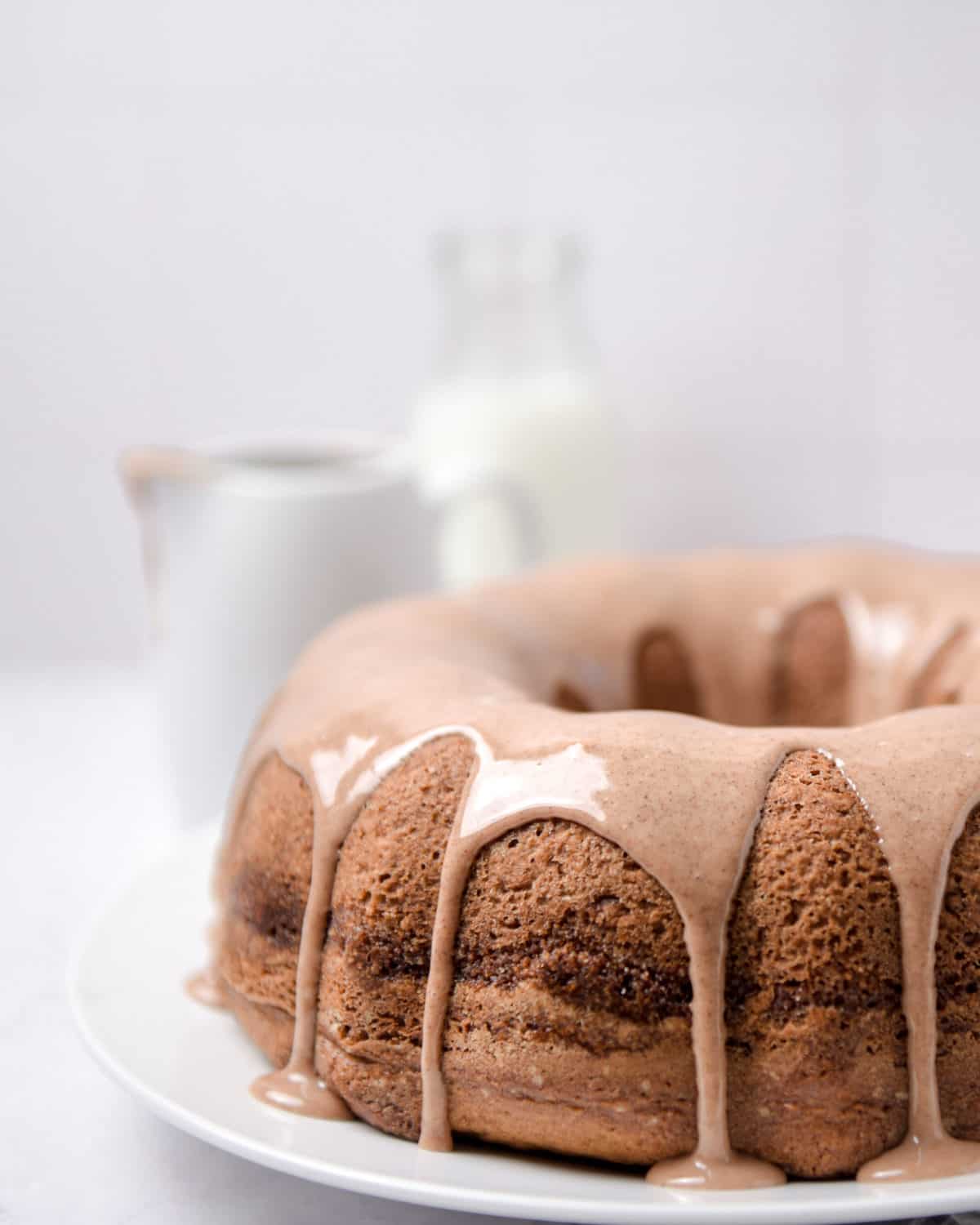A shot of the side of a cinnamon Bundt cake.
