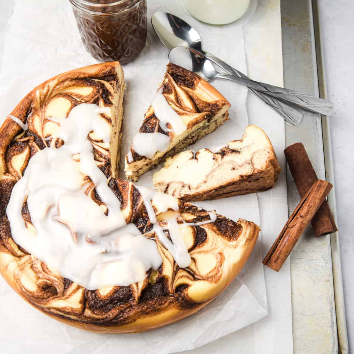 A cinnamon roll cheese cake ready to be served.