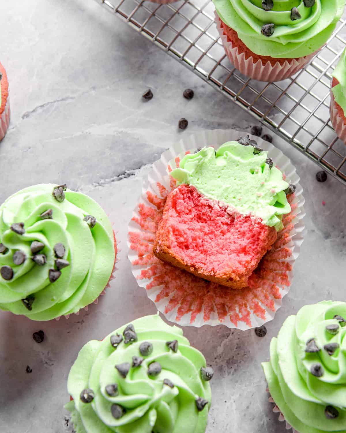 The inside of a pink and green cupcake.