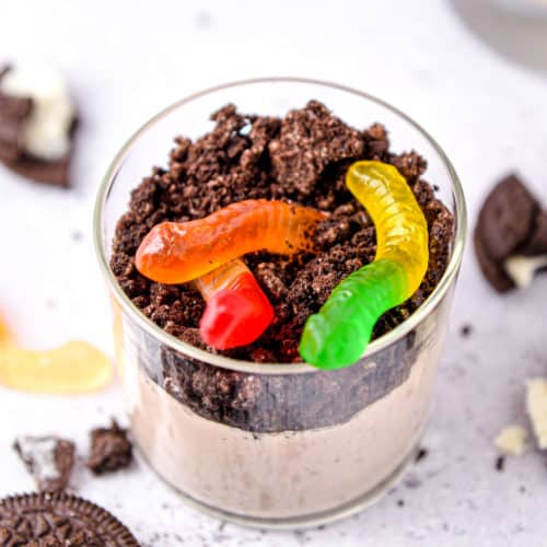 A dirt cup made with chocolate pudding and crushed Oreos.