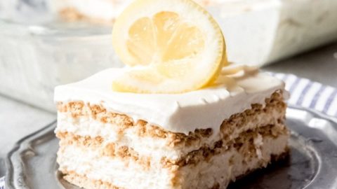 A slice of lemon icebox cake on a plate.