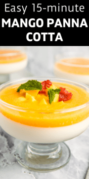 A bowl of mango panna cotta topped with mint and raspberries.