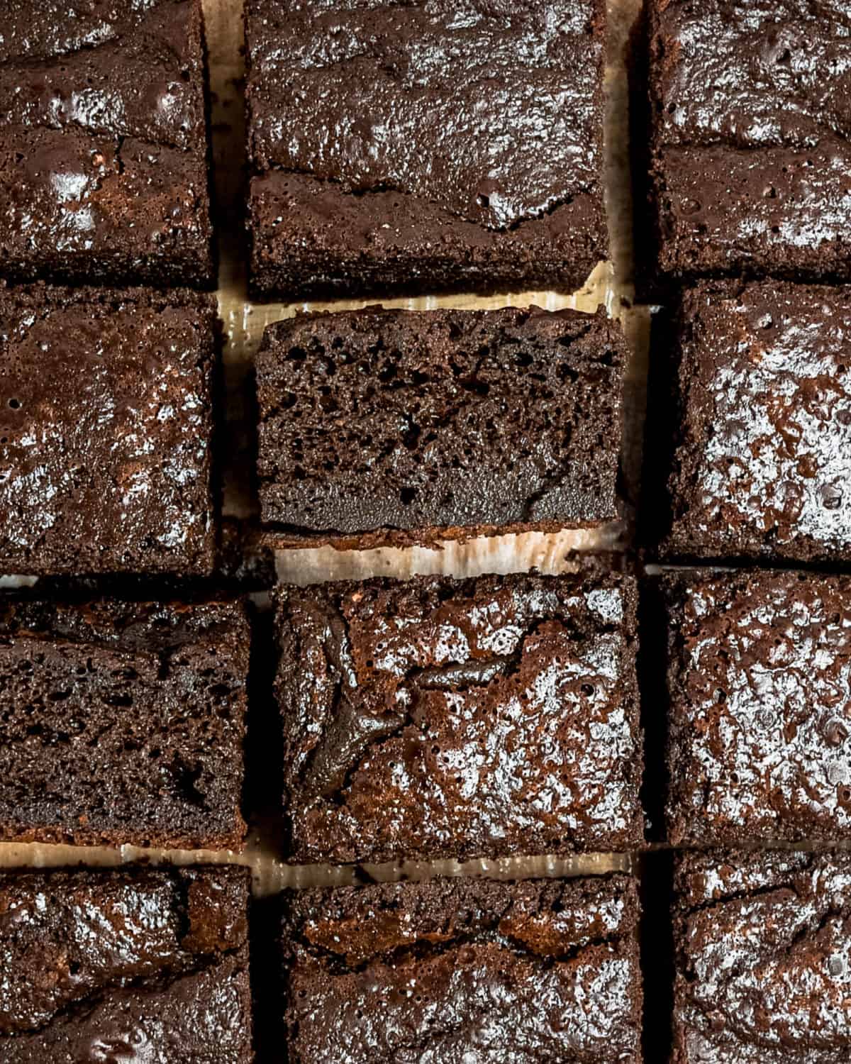 An overhead shot of brownies sliced into squares and close up.