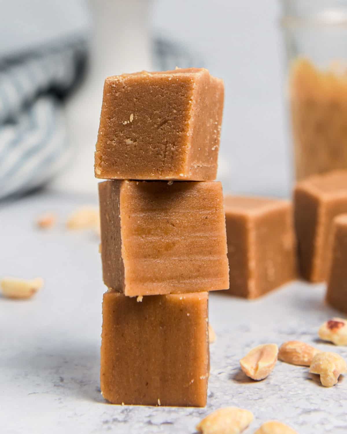 Three fudge pieces stacked on top of each other.