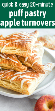 Puff pastry apple turnovers with a fresh apple on a plate.