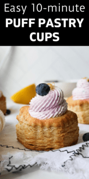 Blueberry mousse puff pastry topped with a fresh blueberry.