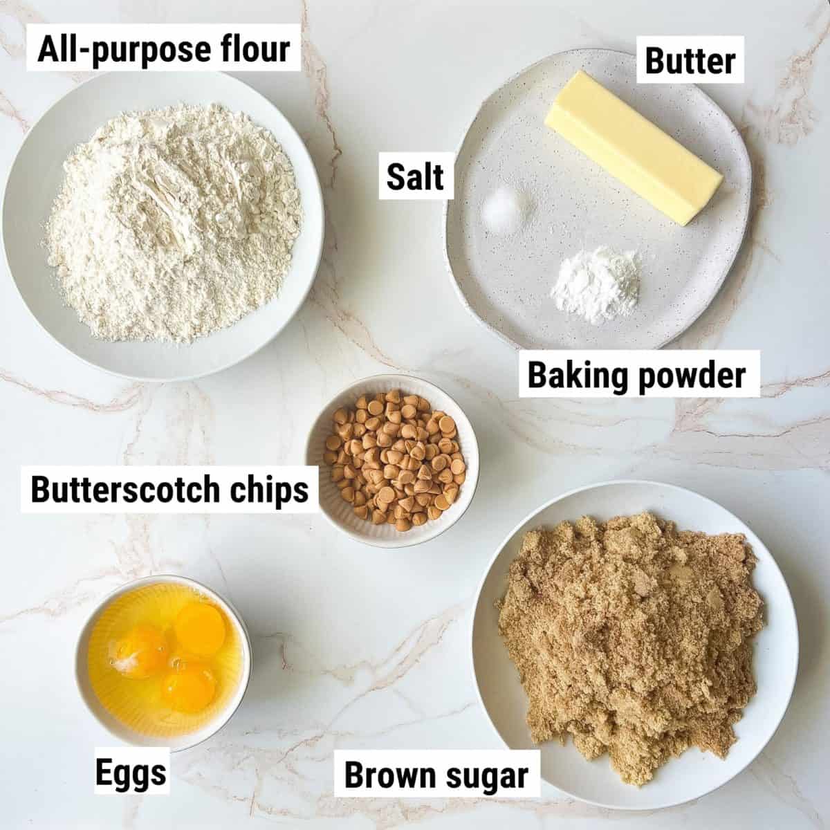 The recipe ingredients used to make butterscotch blondies spread out on a table.