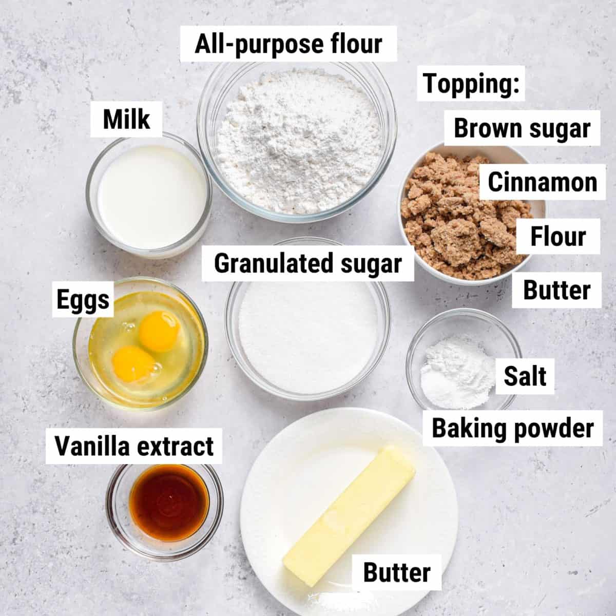 The ingredients used to make cinnamon streusel muffins laid out on a table.