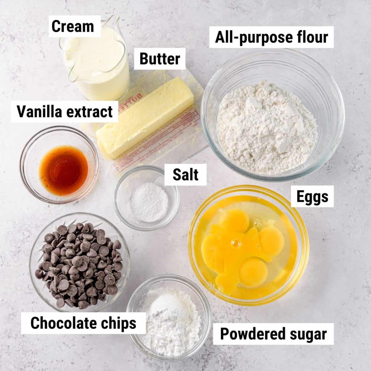The ingredients used to make frozen cream puffs laid out on a table.