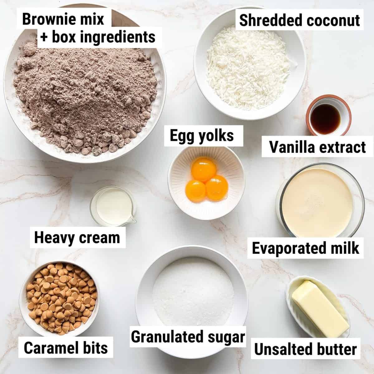 The recipe ingredients used to make German chocolate brownies spread out on a table.