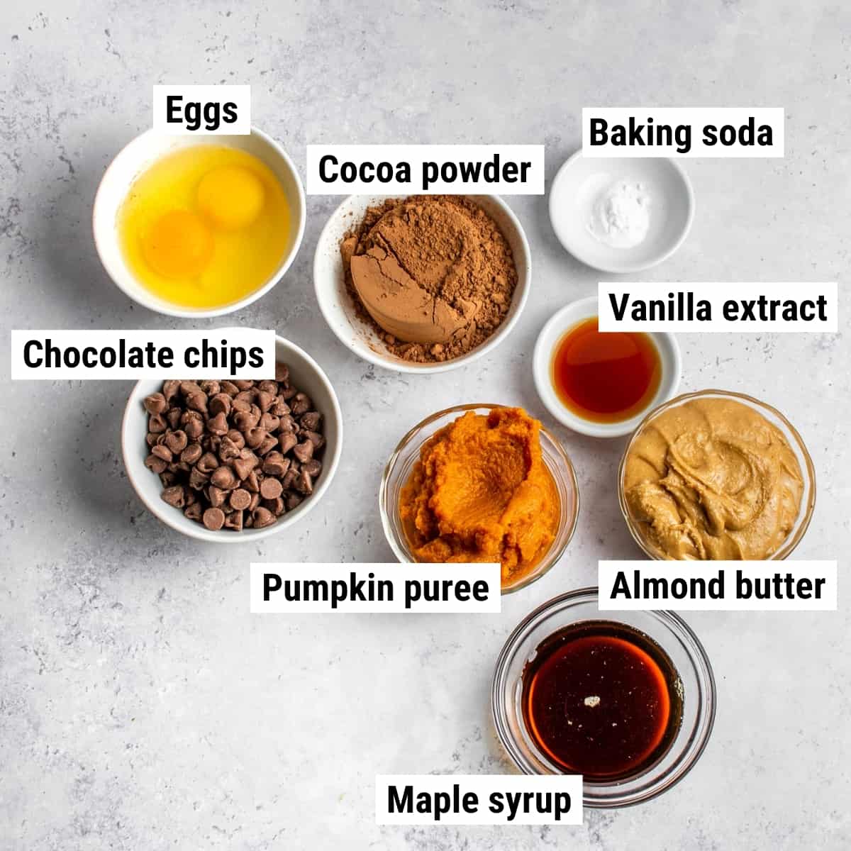 The ingredients used to make healthy pumpkin brownies laid out on a table.