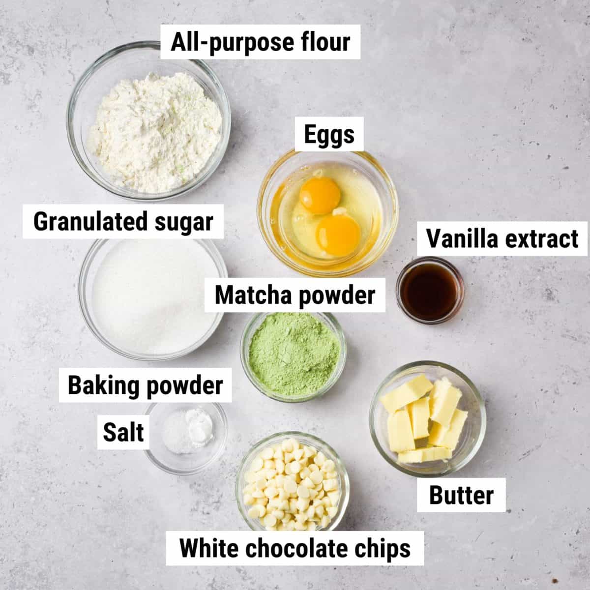 The ingredients used to make matcha brownies laid out on a table.