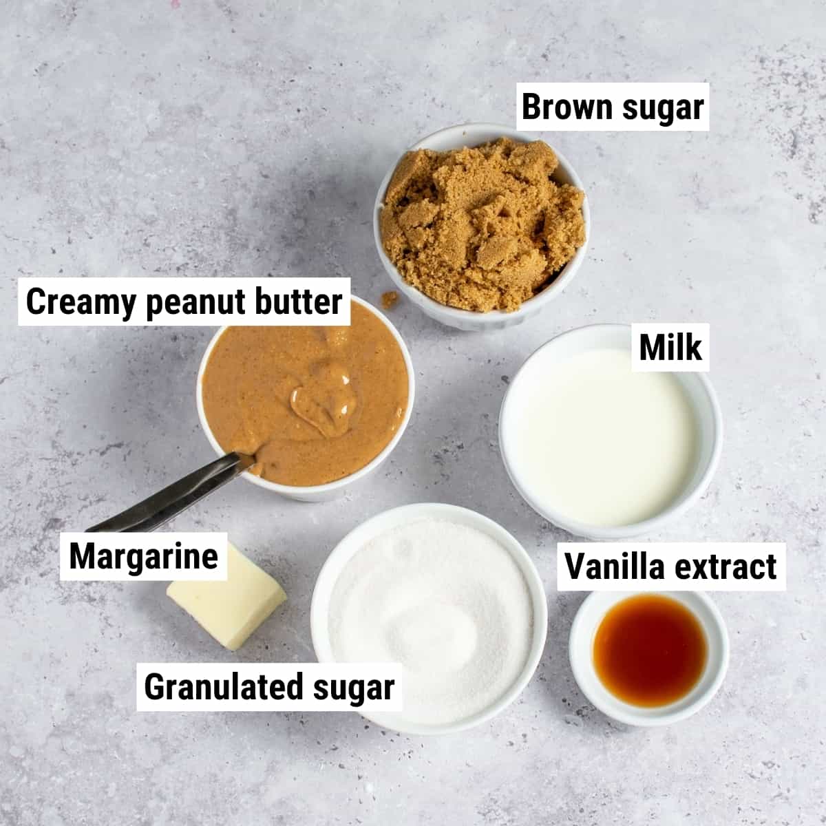 The ingredients used to make old fashioned peanut butter fudge laid out on a table.