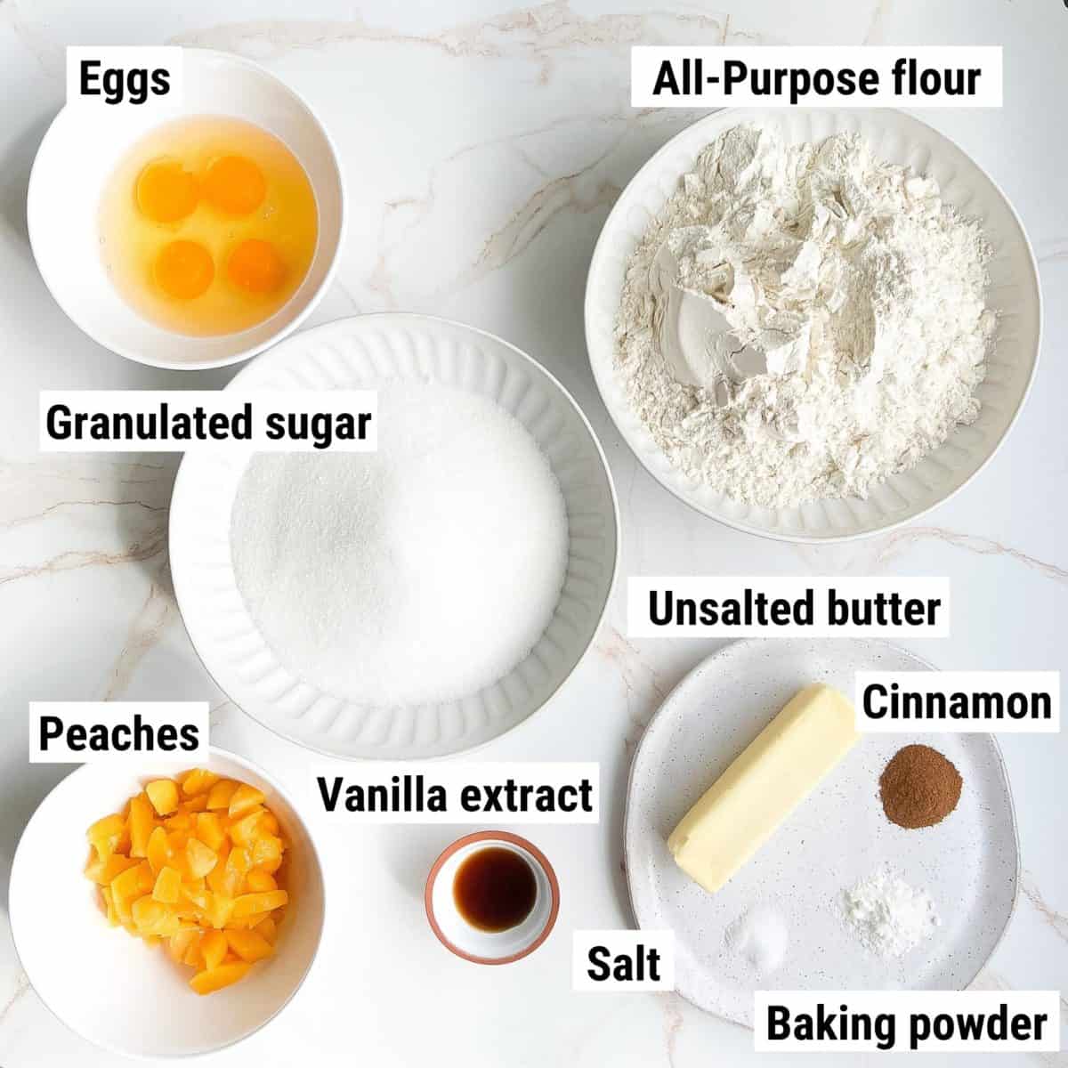 The ingredients used to make peach cobbler pound cake laid out on a table.