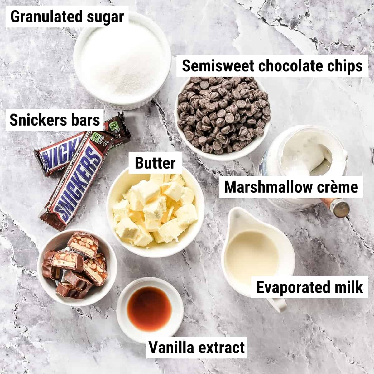 The ingredients to make Snickers fudge laid out on a table.