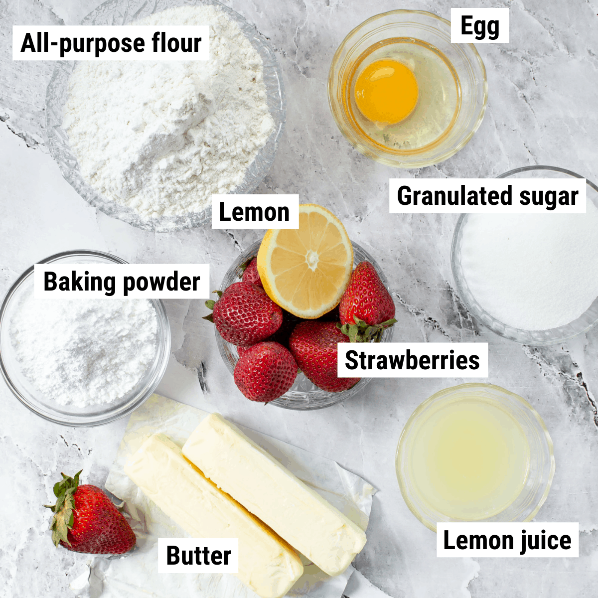 The ingredients for strawberry lemon blondies spread out on a table.
