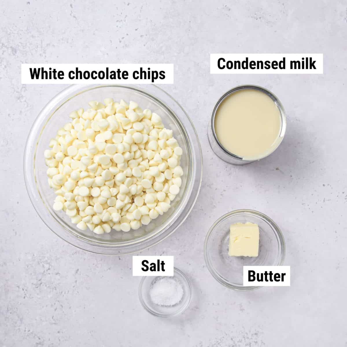 The ingredients used to make white chocolate fudge laid out on a table.