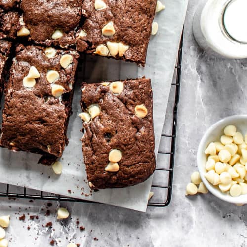 A white chocolate chip brownie up close.