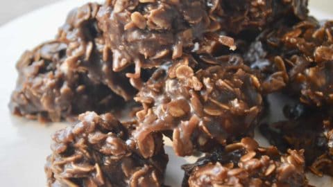 No-bake chocolate coconut cookies on a plate.