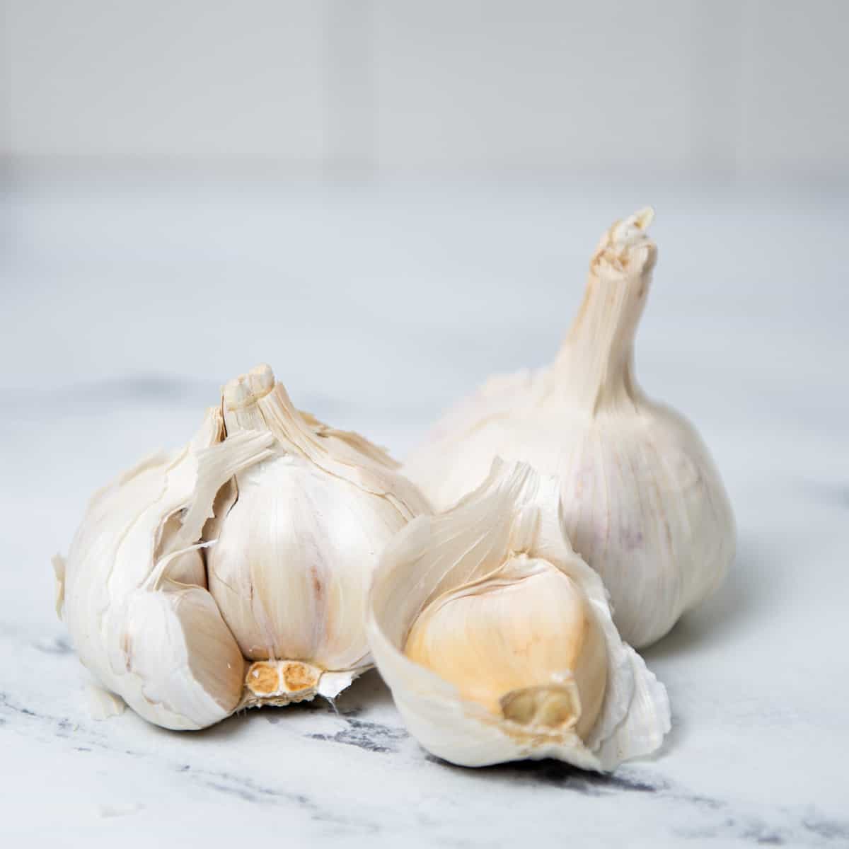 Garlic bulbs on a countertop.